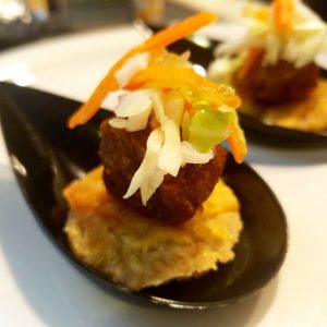 Tostones with fried pork and a spicy coleslaw